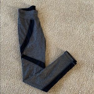 Grey workout leggings with mesh inserts